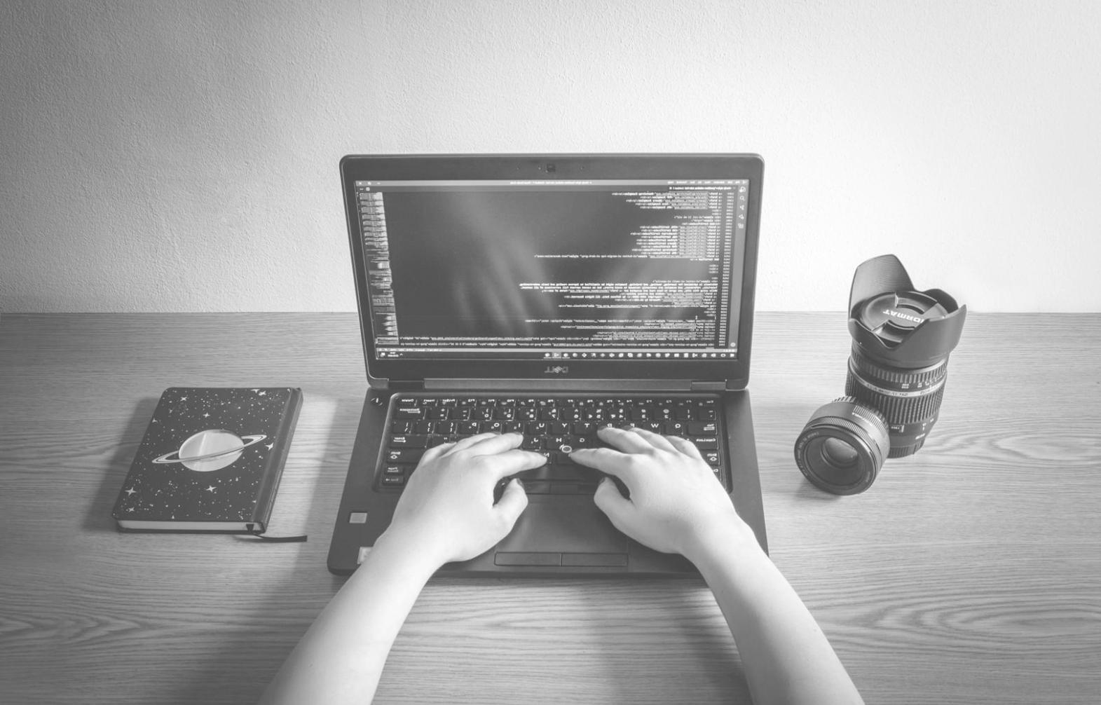 Students collaborating on API integration project during hands-on workshop session